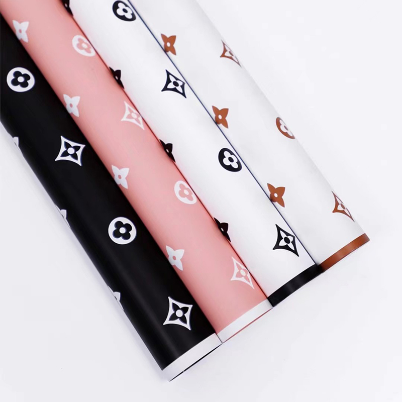 Kertas kado merk Louis